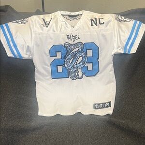 This is a Rebel Vengeance football-style jersey.
